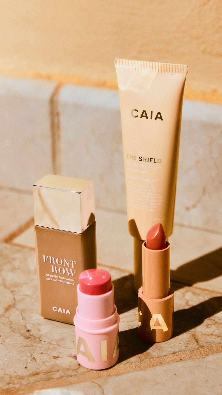 The Shield SPF, Front Row foundation, blush stick, lipstick